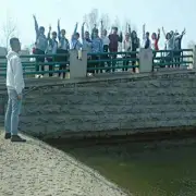某冉